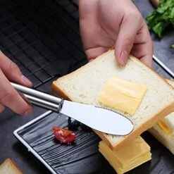 Wide Butter Spreader Knife Set 4-Piece Stainless Steel Cheese Knife Serrated Edge Sandwich Condiment Jam Bread Cream Knives 7.8-inch -Peugeot Shop 51JjdjUpgtL